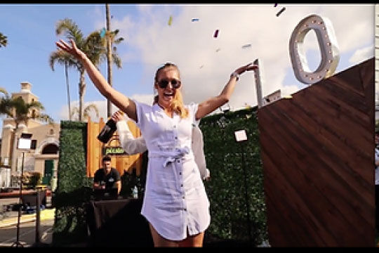 Guest posing for the GlamBot at a brand activation